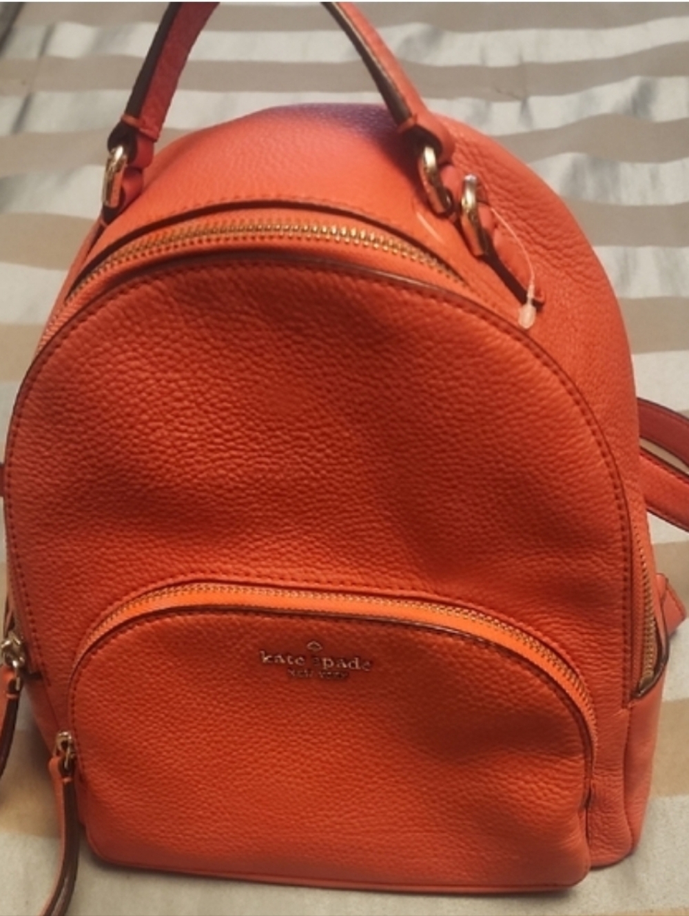 Kate Spade Coral Pebbled Leather Backpack with Gold Accents NWT